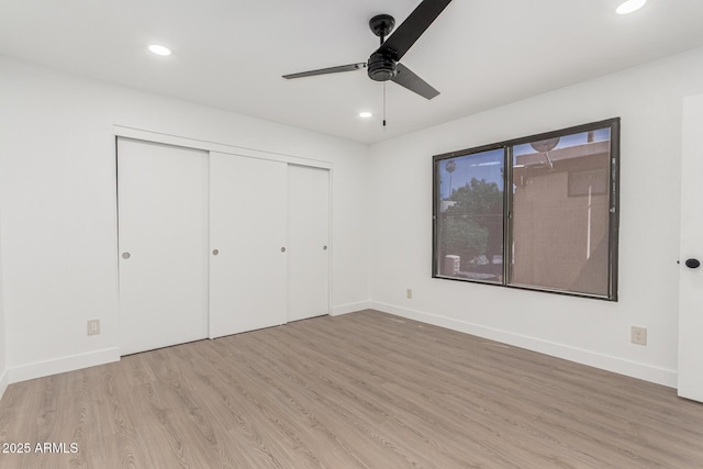 515 S Saguaro Way, Mesa, AZ 85208 - unfurnished bedroom with wood finished floors, a closet, recessed lighting, and ceiling fan