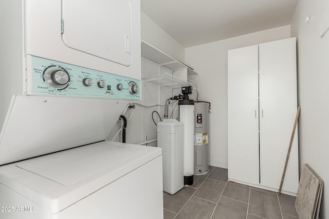 515 S Saguaro Way, Mesa, AZ 85208 - laundry room featuring stacked washer / drying machine, light tile patterned floors, and electric water heater