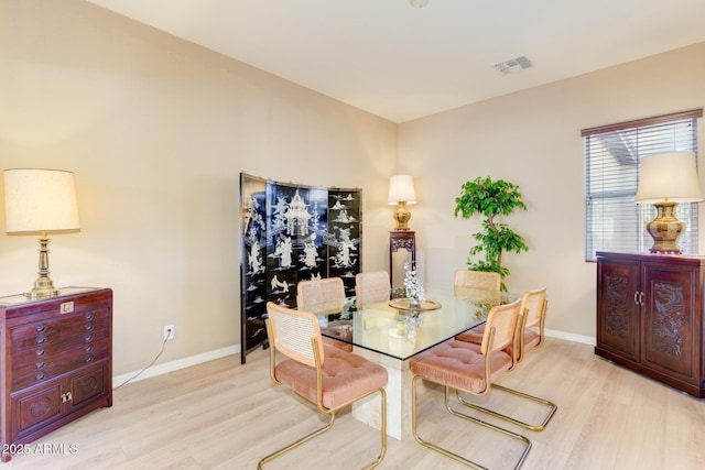16758 W Apache St, Goodyear, AZ 85338 - dining space with wood finished floors and baseboards