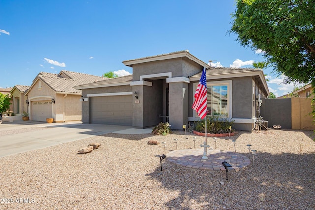 81 E Rock Wren Dr, San Tan Valley, AZ 85143 - view of front facade with stucco siding, an attached garage, concrete driveway, and a tiled roof