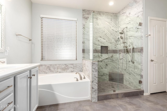 81 E Rock Wren Dr, San Tan Valley, AZ 85143 - full bathroom featuring a garden tub, a marble finish shower, vanity, and tile patterned flooring