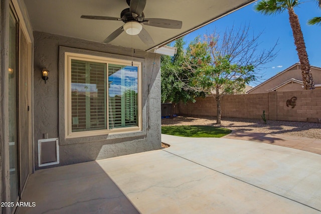 81 E Rock Wren Dr, San Tan Valley, AZ 85143 - fenced backyard with a ceiling fan and a patio