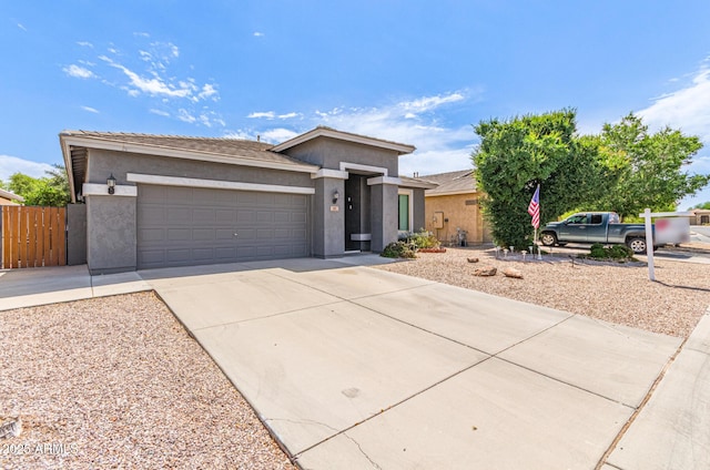 81 E Rock Wren Dr, San Tan Valley, AZ 85143 - view of front of property featuring stucco siding, an attached garage, and concrete driveway