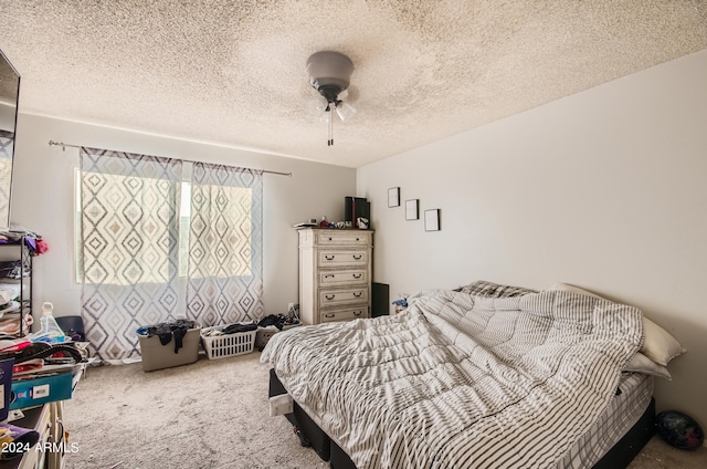 13802 N 37th Dr, Phoenix, AZ 85053 - bedroom featuring carpet flooring, a textured ceiling, and ceiling fan