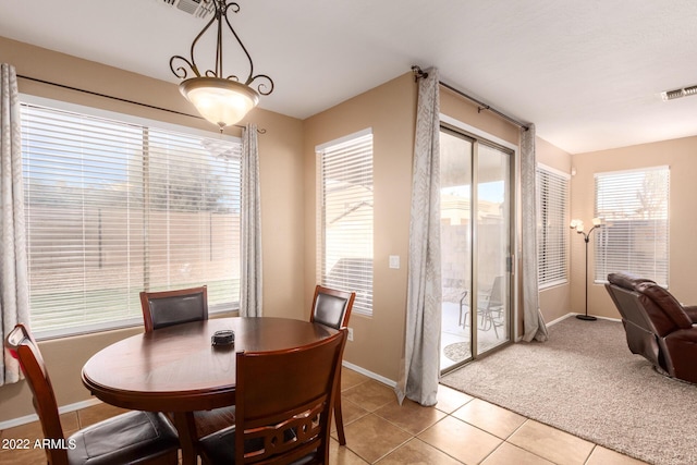 view of tiled dining space