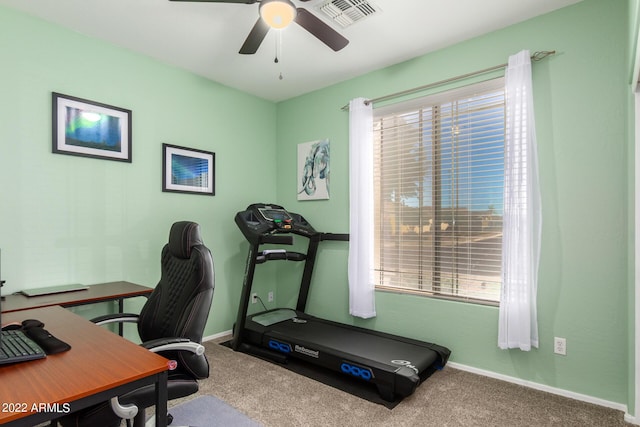 office with carpet flooring and ceiling fan