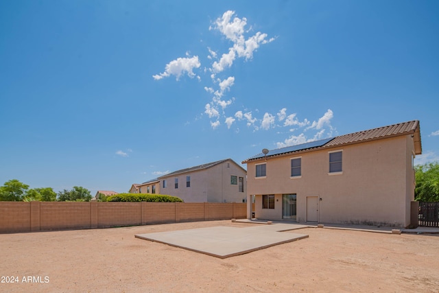 rear view of property with a patio area