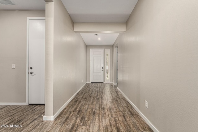 hallway featuring wood-type flooring