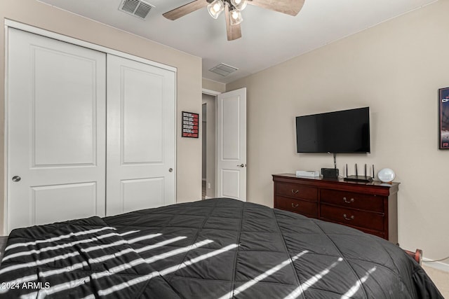 bedroom with carpet floors, a closet, and ceiling fan