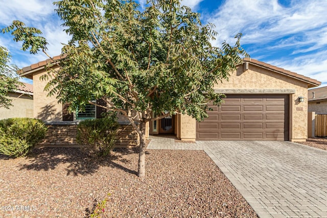 view of front of property featuring a garage