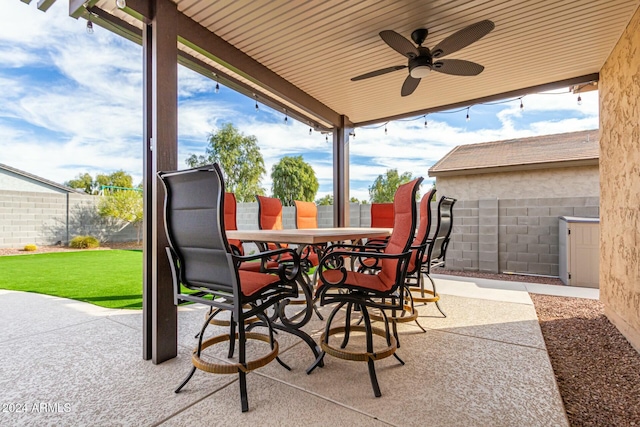 view of patio featuring ceiling fan