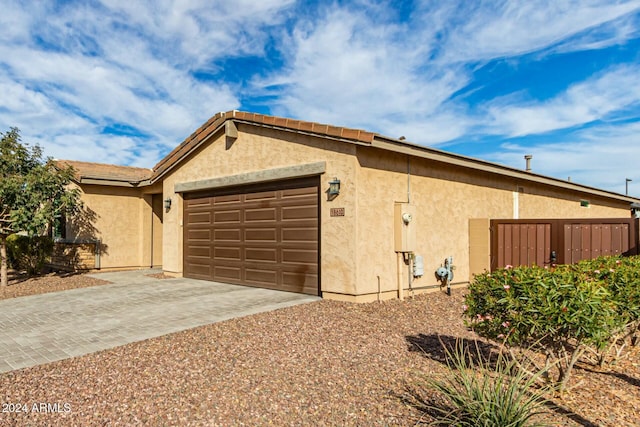 view of home's exterior with a garage