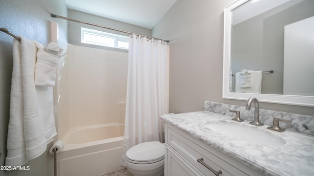 bathroom with shower / tub combo, vanity, and toilet