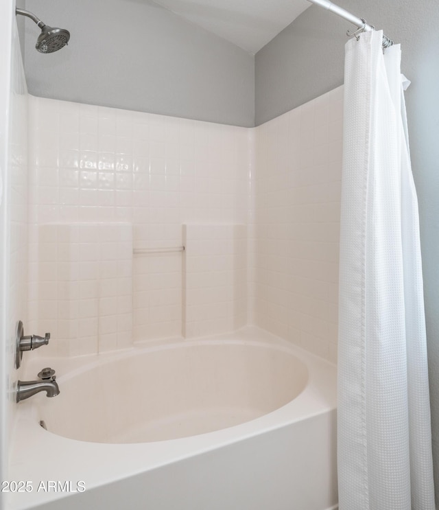 full bathroom with shower / tub combo with curtain