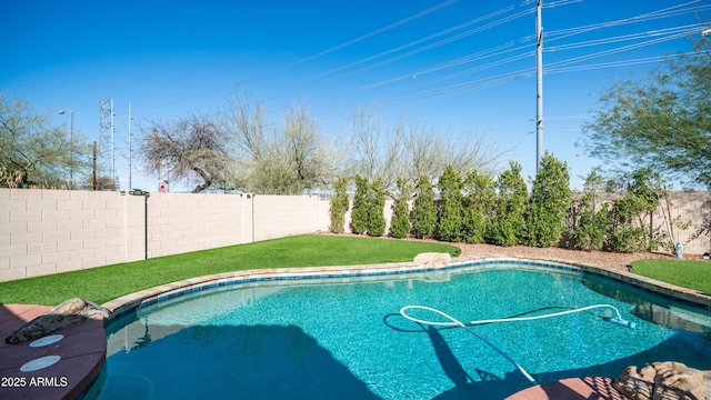 view of swimming pool featuring a fenced in pool and a fenced backyard