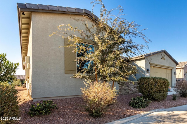 view of home's exterior featuring a garage