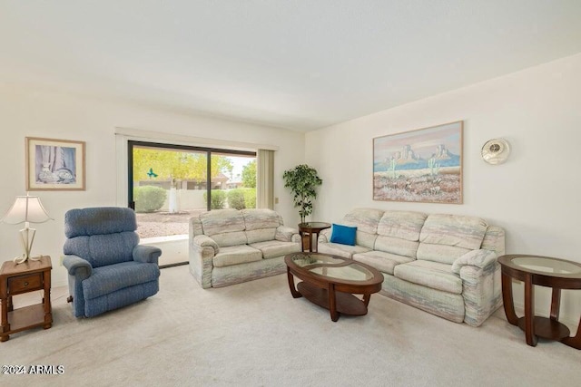 living room featuring light carpet