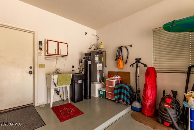 garage featuring water heater