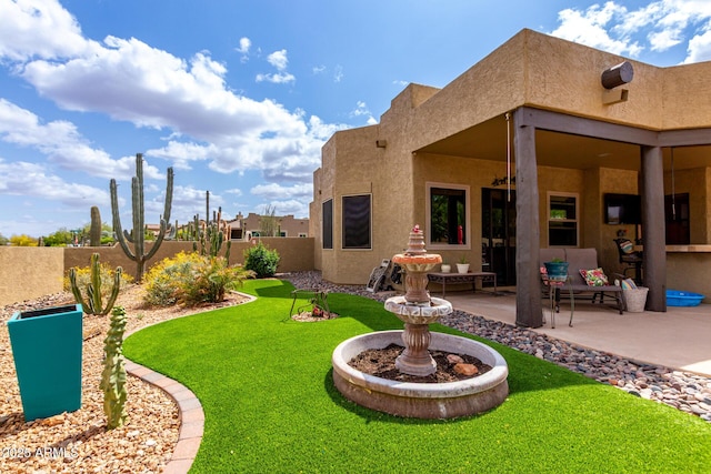 view of yard featuring a fenced backyard and a patio