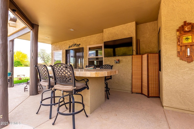 view of patio / terrace with outdoor dry bar
