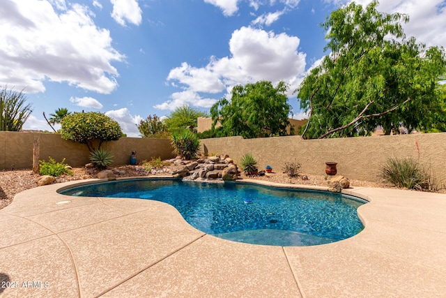 view of pool with a patio, a fenced in pool, and a fenced backyard