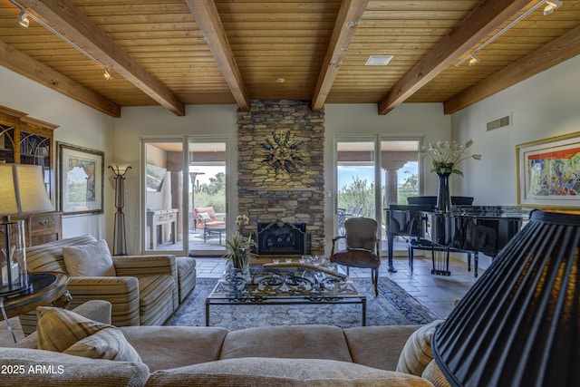 1401 E Boulder Pass, Carefree, AZ 85377 - living room featuring wooden ceiling, track lighting, plenty of natural light, and beamed ceiling