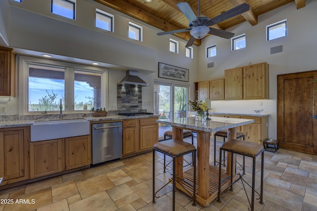 1401 E Boulder Pass, Carefree, AZ 85377 - kitchen with ceiling fan, a high ceiling, wood ceiling, a sink, and stainless steel appliances