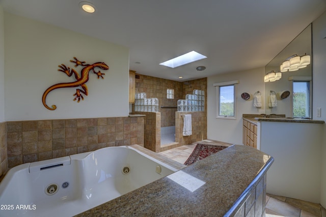 1401 E Boulder Pass, Carefree, AZ 85377 - full bath with vanity, a skylight, walk in shower, and a jetted tub