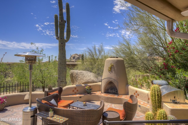 1401 E Boulder Pass, Carefree, AZ 85377 - view of patio / terrace featuring area for grilling, fence, and exterior fireplace