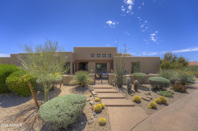 1401 E Boulder Pass, Carefree, AZ 85377 - pueblo revival-style home featuring stucco siding
