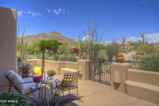 1401 E Boulder Pass, Carefree, AZ 85377 - view of patio with a gate and a mountain view
