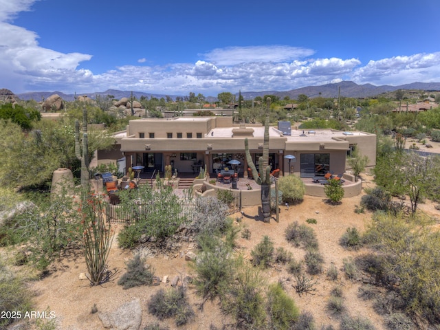1401 E Boulder Pass, Carefree, AZ 85377 - back of house with stucco siding, a mountain view, fence, and a patio