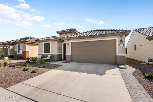 mediterranean / spanish-style home featuring a garage