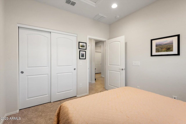26947 W Adam Ave, Buckeye, AZ 85396 - bedroom featuring a closet, light colored carpet, baseboards, and recessed lighting