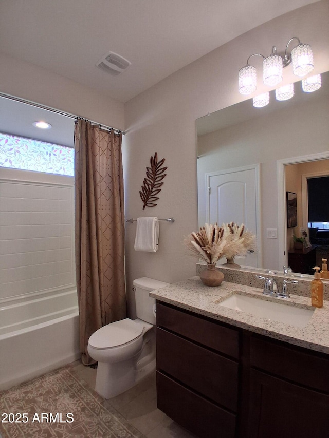 26947 W Adam Ave, Buckeye, AZ 85396 - full bath featuring tile patterned floors, toilet, vanity, and shower / tub combo with curtain