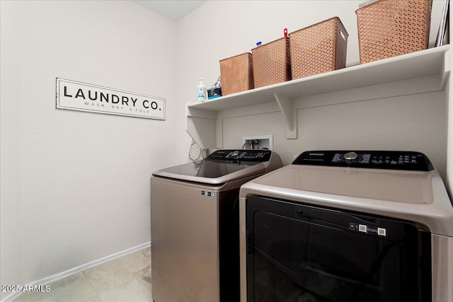 26947 W Adam Ave, Buckeye, AZ 85396 - laundry room featuring separate washer and dryer and baseboards