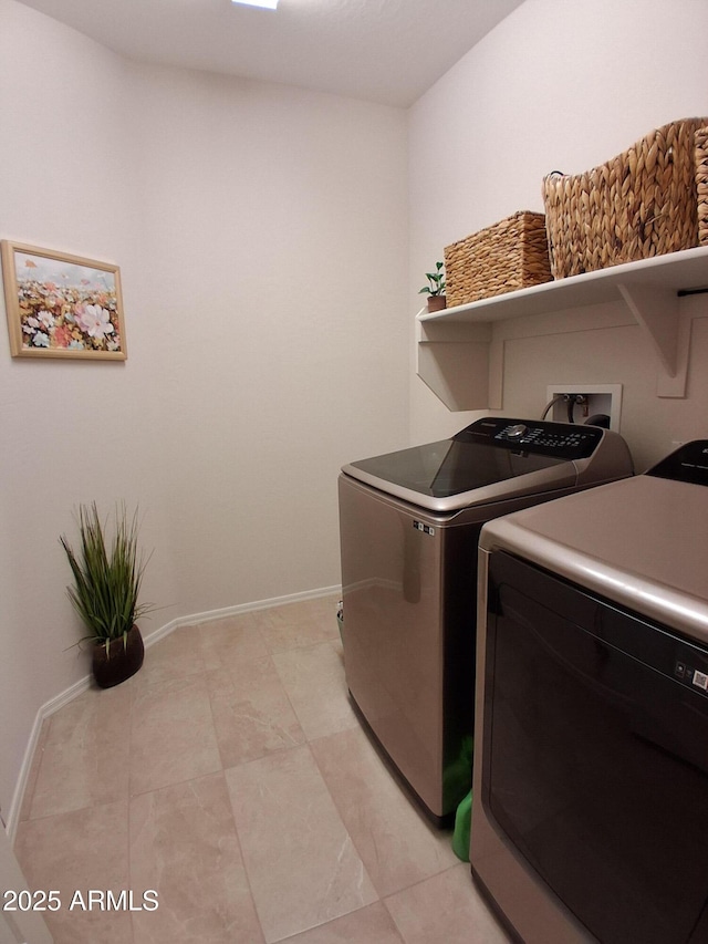 26947 W Adam Ave, Buckeye, AZ 85396 - clothes washing area featuring independent washer and dryer and baseboards