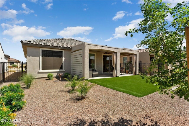 26947 W Adam Ave, Buckeye, AZ 85396 - back of house with stucco siding, a patio area, and a tile roof