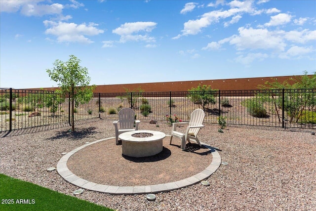 26947 W Adam Ave, Buckeye, AZ 85396 - view of patio / terrace featuring an outdoor fire pit and fence