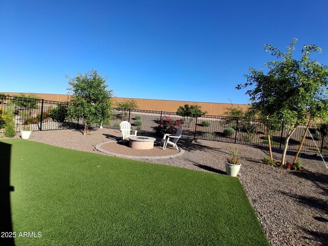 26947 W Adam Ave, Buckeye, AZ 85396 - view of yard with a fire pit and a patio area