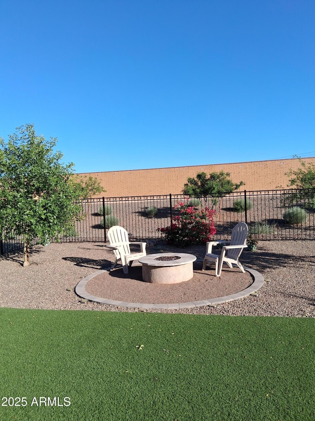 26947 W Adam Ave, Buckeye, AZ 85396 - view of yard with an outdoor fire pit and a patio