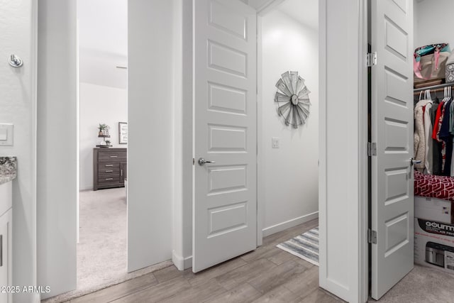 hall featuring light hardwood / wood-style floors