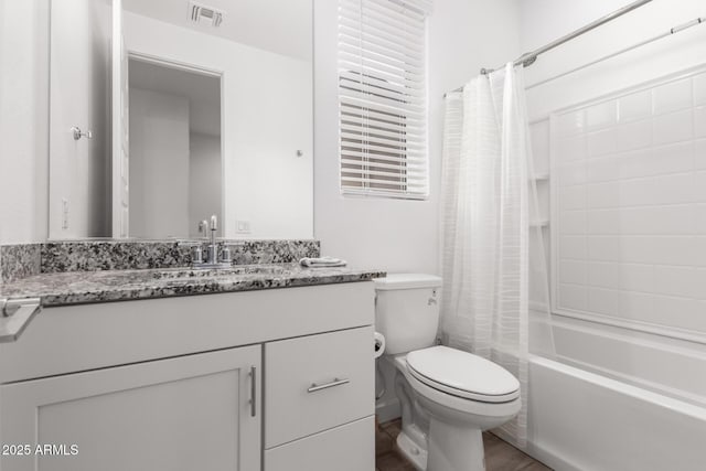 full bathroom with wood-type flooring, vanity, toilet, and shower / bath combo with shower curtain