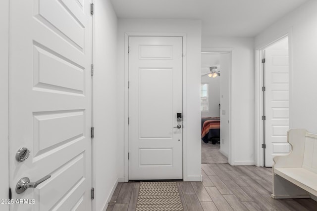 interior space featuring ceiling fan