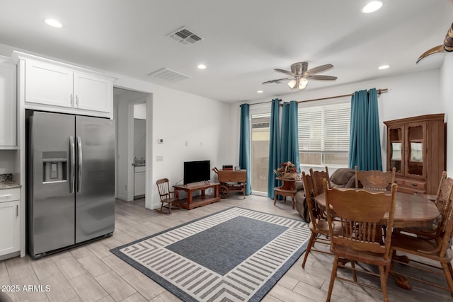 dining space featuring ceiling fan