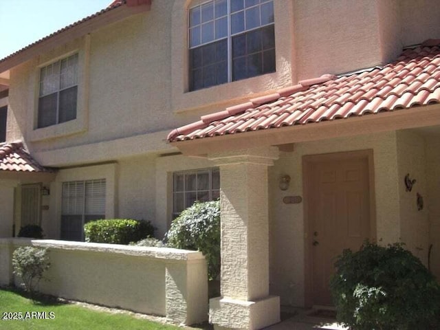 5808 E Brown Rd Unit 119, Mesa, AZ 85205 - exterior space with a tiled roof and stucco siding