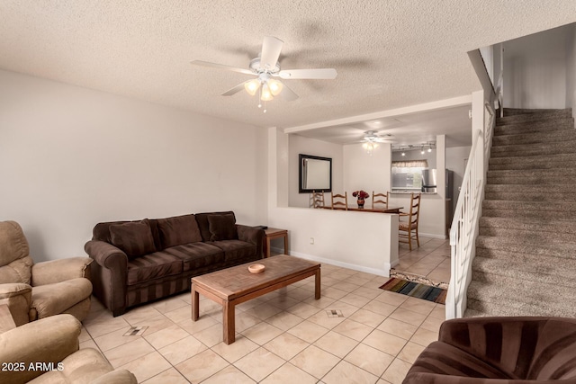 5808 E Brown Rd Unit 119, Mesa, AZ 85205 - living area with a textured ceiling, light tile patterned flooring, baseboards, stairs, and ceiling fan
