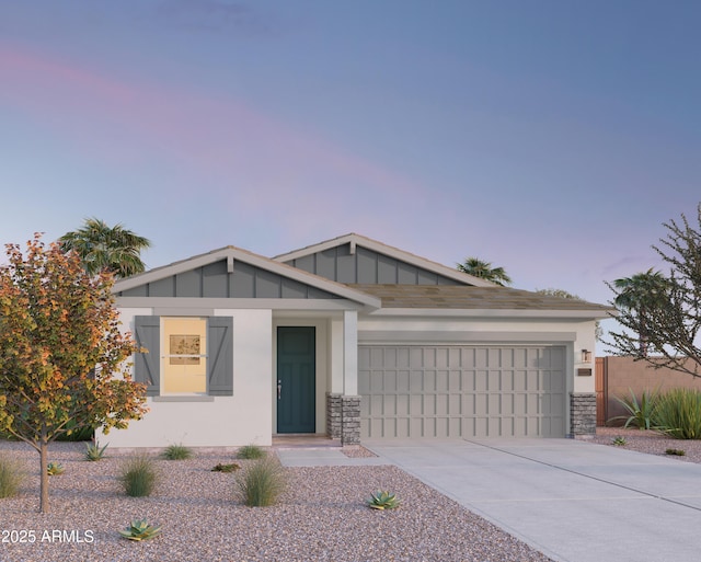 single story home featuring concrete driveway and an attached garage