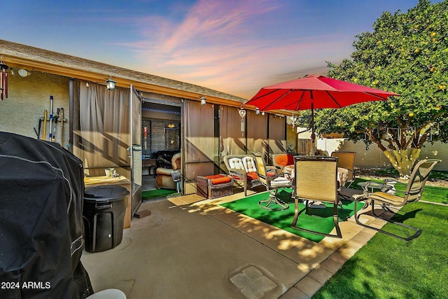 18903 N 97th Ln, Peoria, AZ 85382 - view of patio with a grill and outdoor dining space