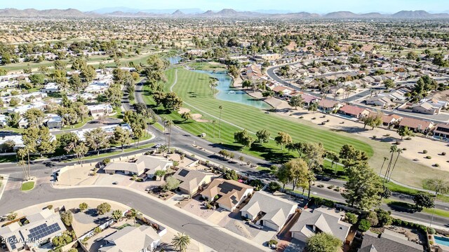 18903 N 97th Ln, Peoria, AZ 85382 - aerial overview of property's location with a water and mountain view, nearby suburban area, and a golf club